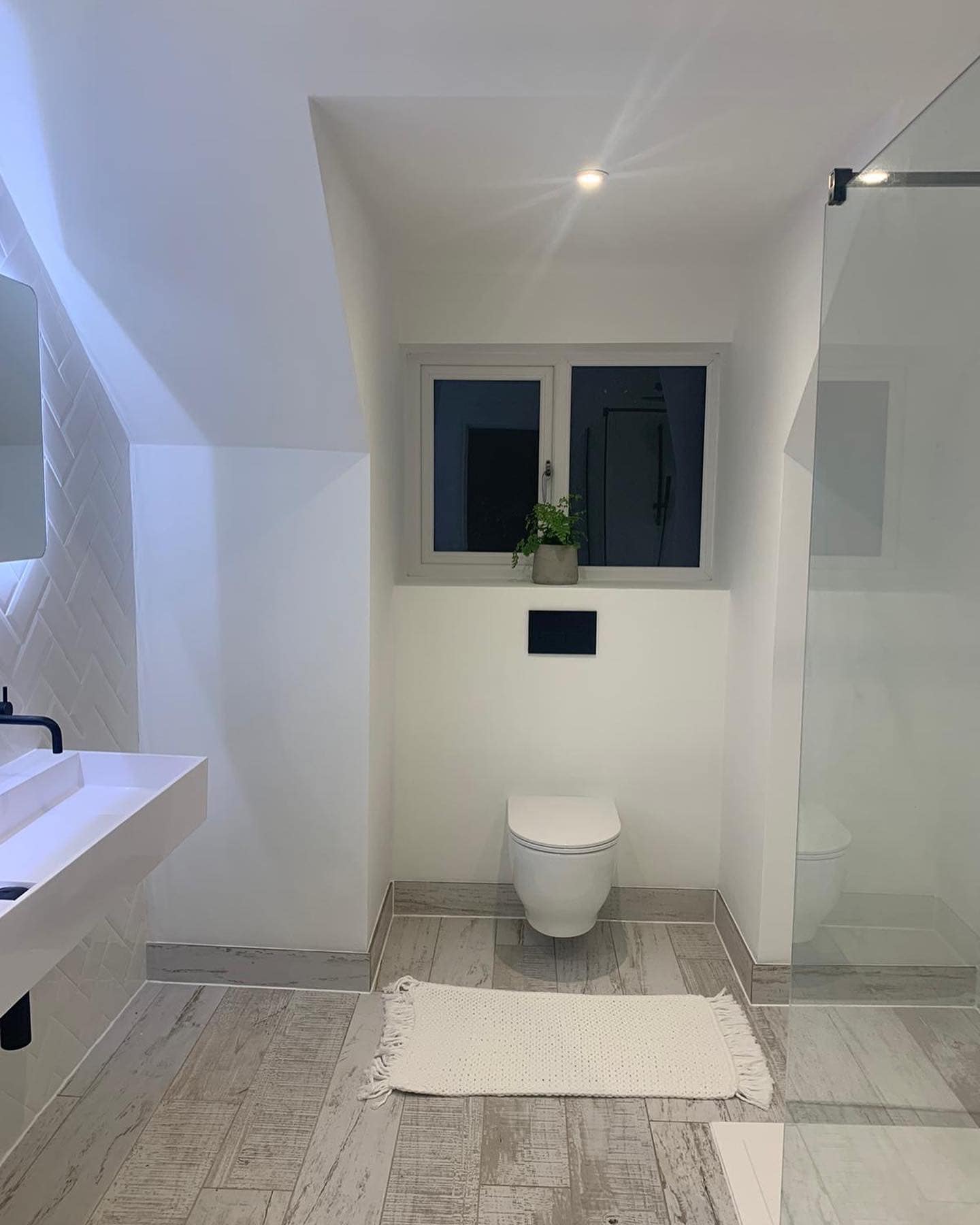 Herringbone Tile Finish and Underfloor Heating Bathrooms by LV