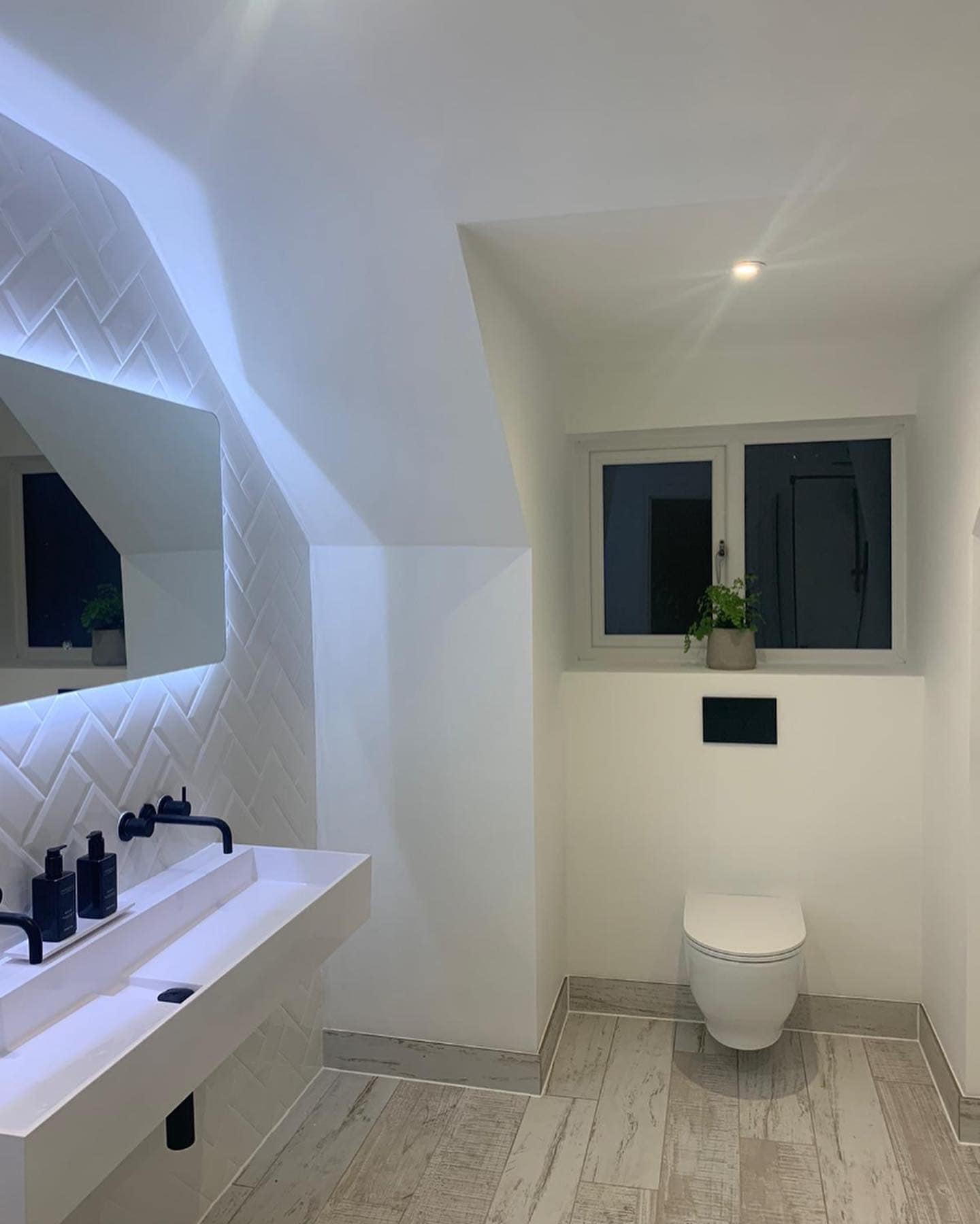 Herringbone Tile Finish and Underfloor Heating Bathrooms by LV