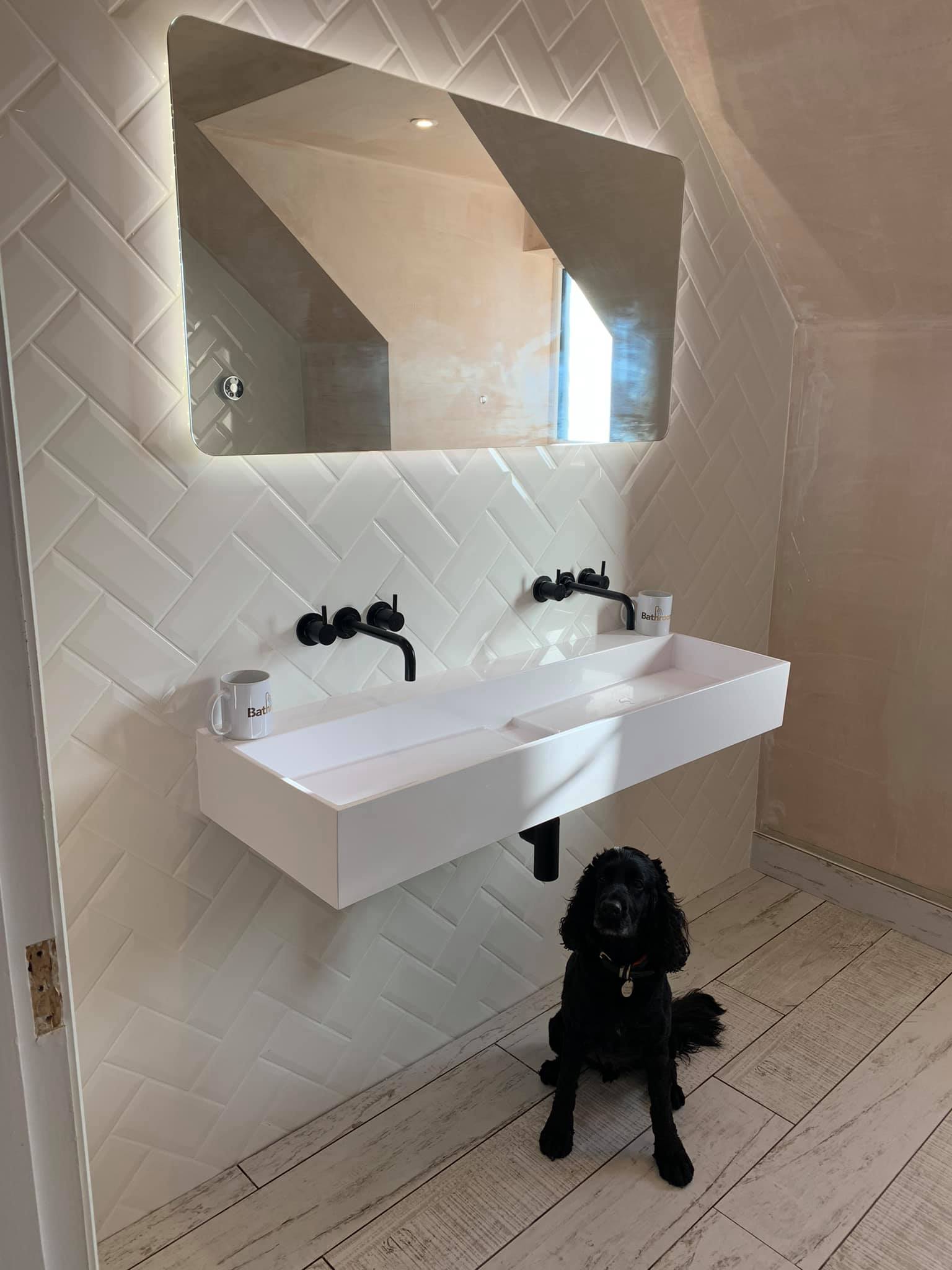 Herringbone Tile Finish and Underfloor Heating Bathrooms by LV